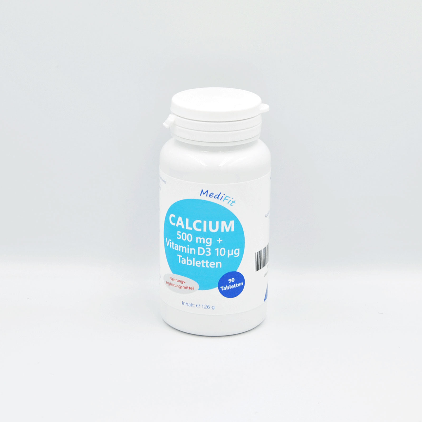 Braun-weiße Flasche mit Calcium- und Vitamin D3-Tabletten, Beschriftung: "CALCIUM 500 mg + Vitamin D3 10 µg".