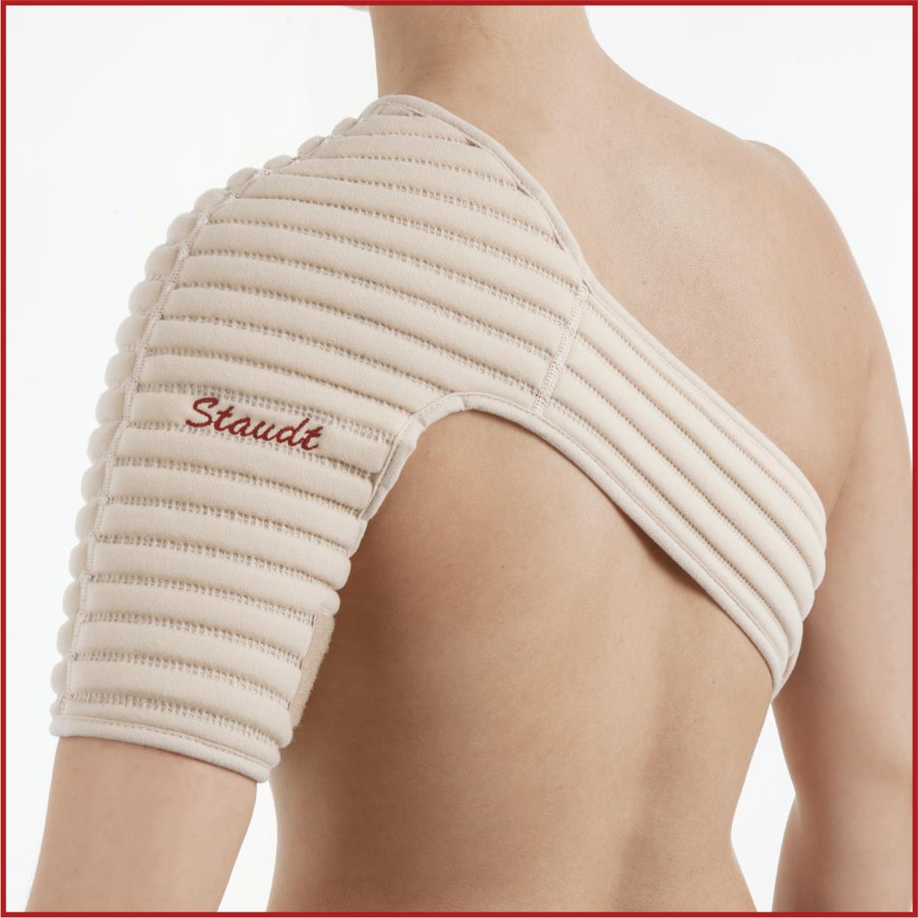 Beige Schulterbandage mit Noppenstruktur und eingesticktem Schriftzug "Staudt".