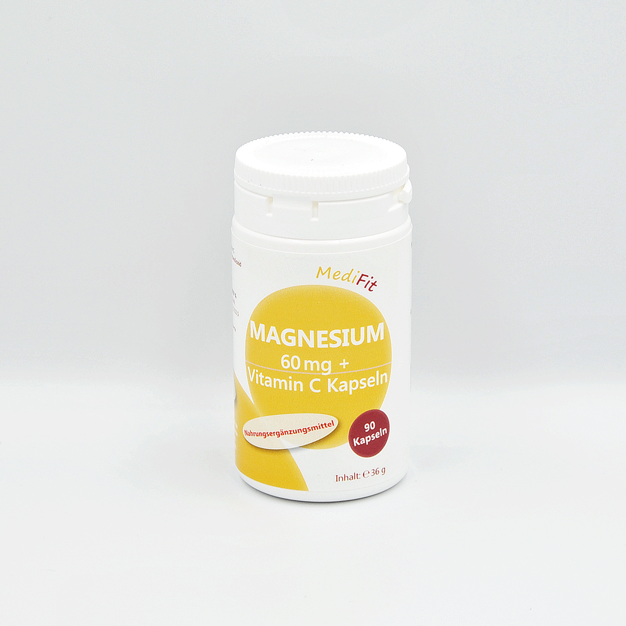 Weißer Behälter mit dem Aufdruck "MAGNESIUM 60 mg + Vitamin C Kapseln", enthält 90 Kapseln, 236 g.