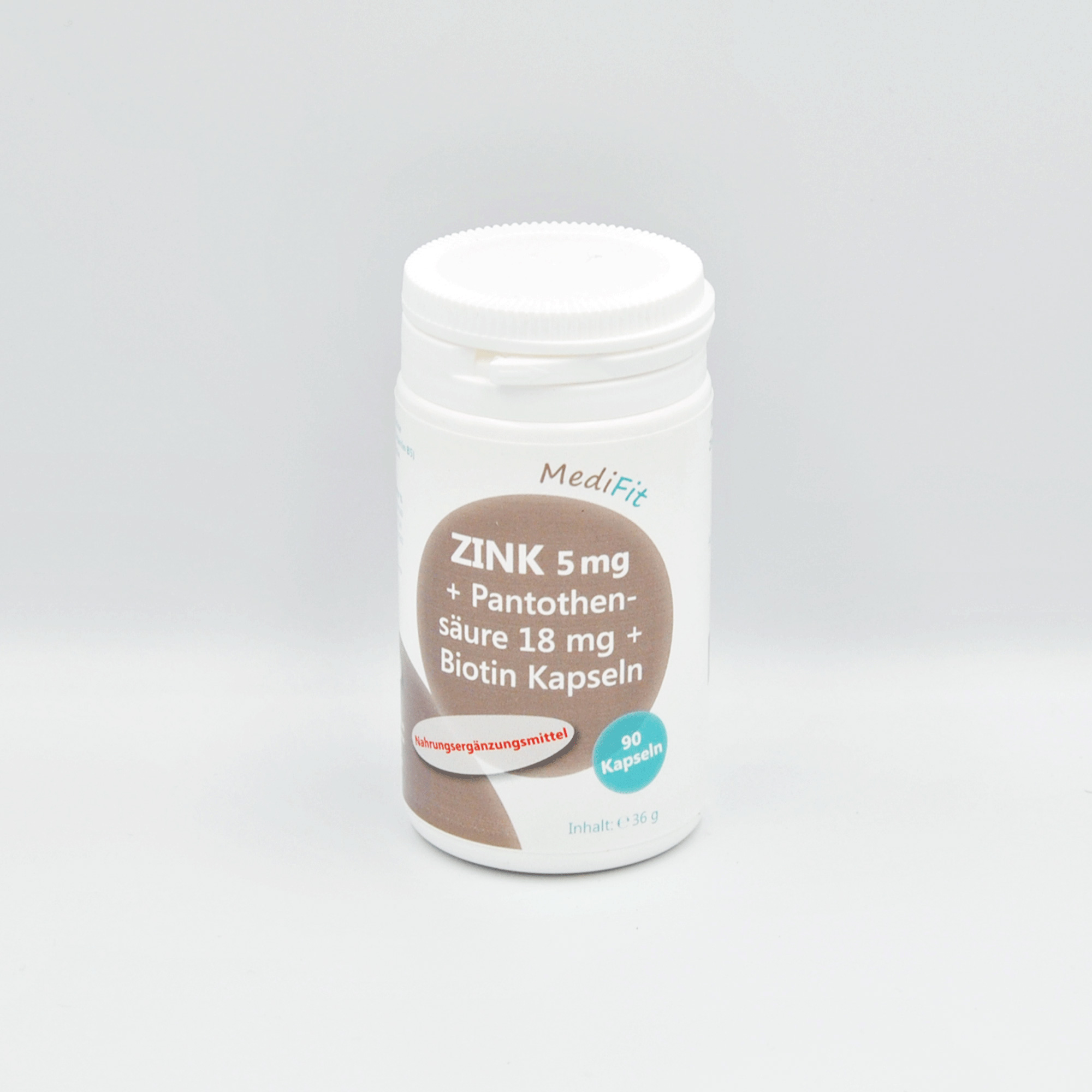 Weißer Behälter mit Kapseln, beschriftet mit "ZINK 5 mg + Pantothensäure 18 mg + Biotin Kapseln", enthält 90 Kapseln.