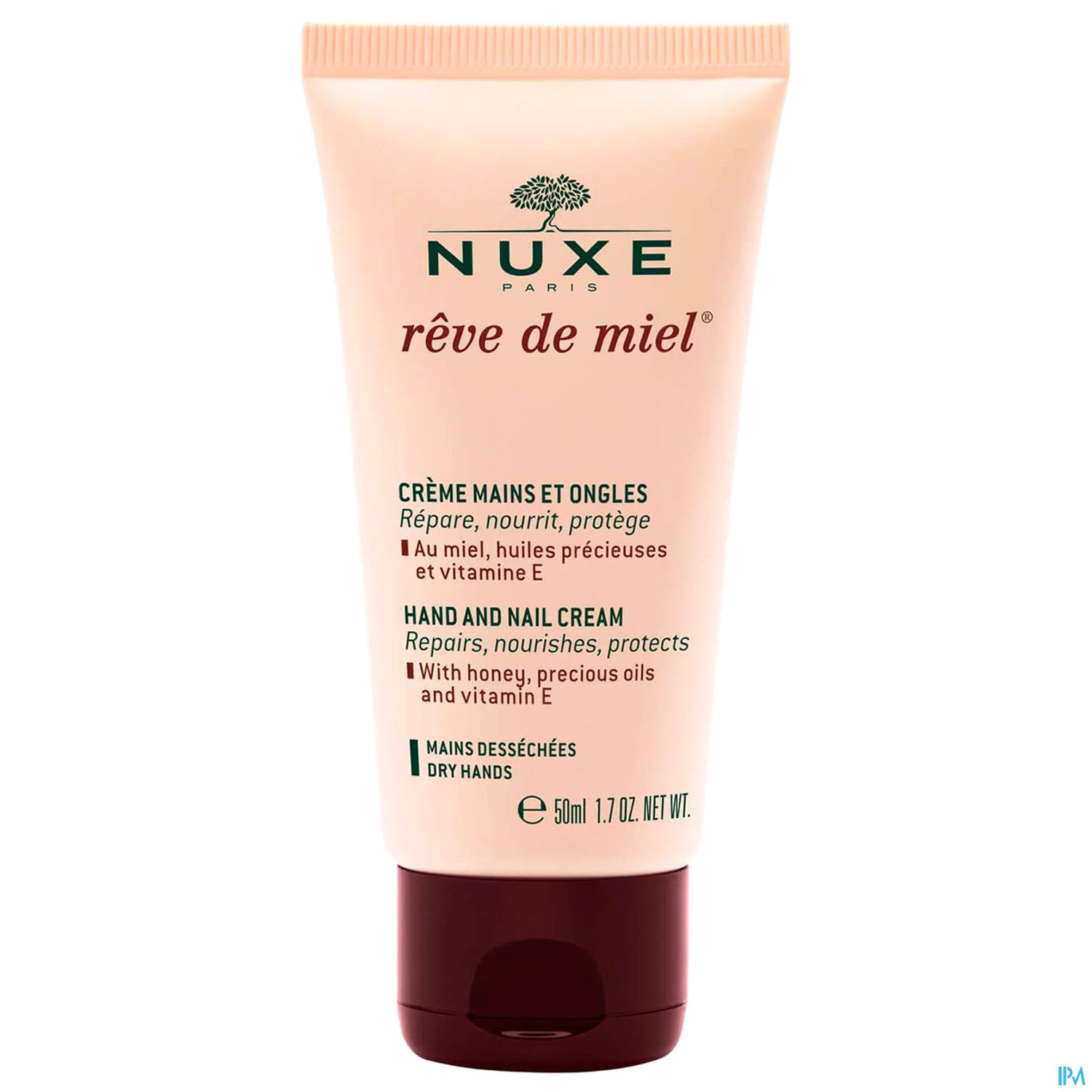 Tube einer Hand- und Nagelcreme der Marke NUXE mit der Aufschrift "rêve de miel", in einer hellen Verpackung mit braunem Deckel.