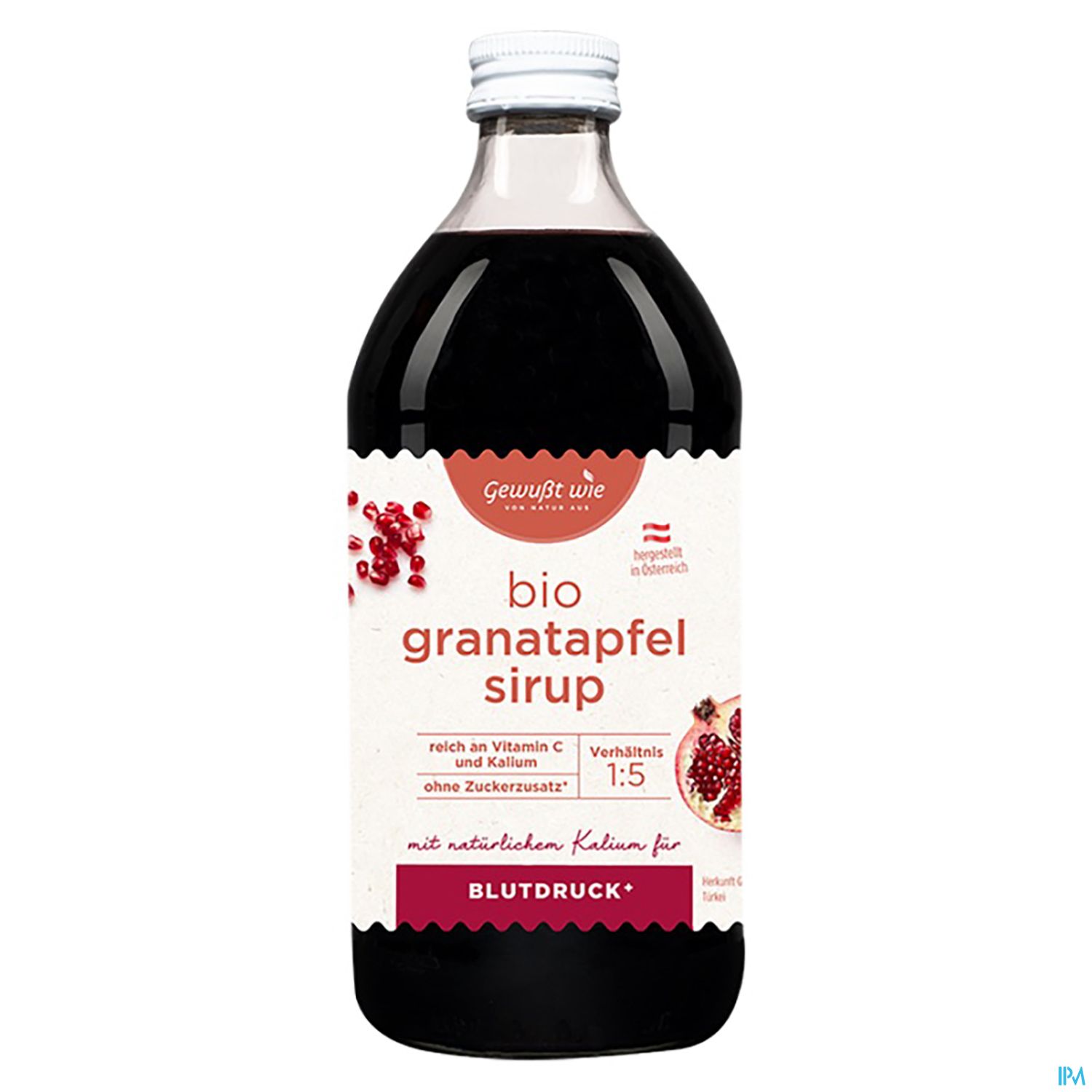 Flasche mit bio Granatapfel-Sirup, Etikett mit Angaben zu Inhaltsstoffen, Nährwerten und Verwendungshinweisen.