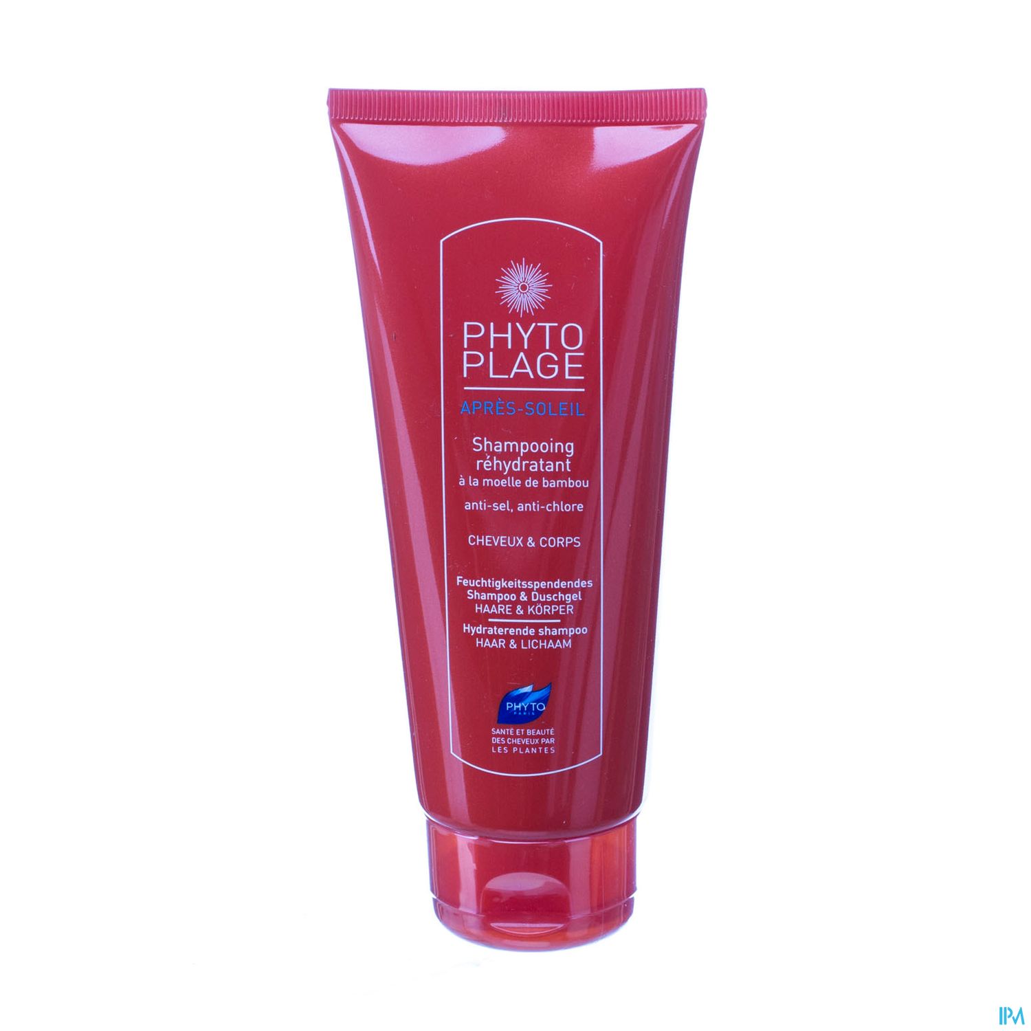 Rote Tube mit dem Produkt "Phyto Plage Après-Soleil - Shampooing réhydratant" für Haare und Körper.