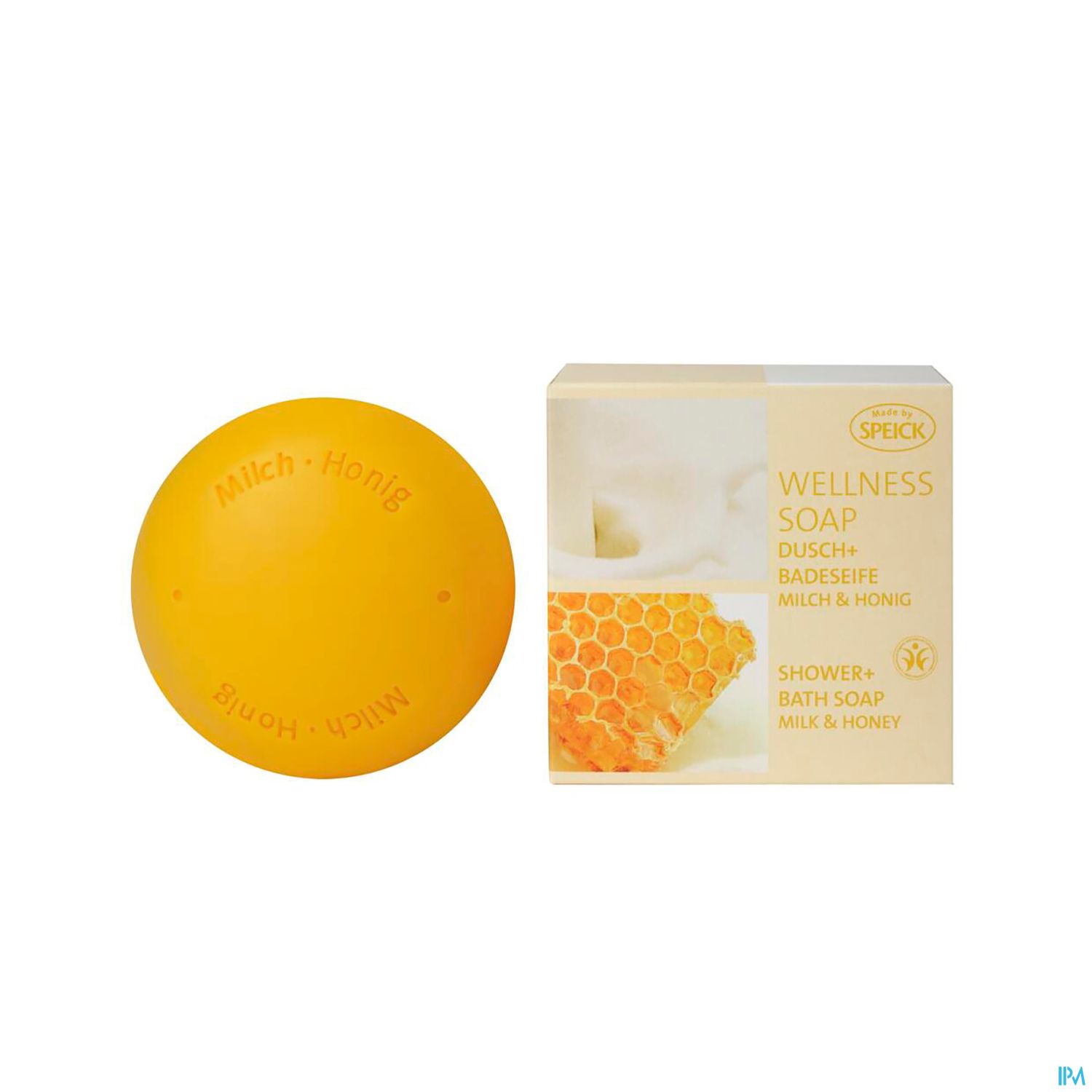 Seife in Form einer orangefarbenen Kugel neben einer Verpackung mit Aufschrift "Wellness Soap - Dusch- und BadeSeife Milch & Honig".
