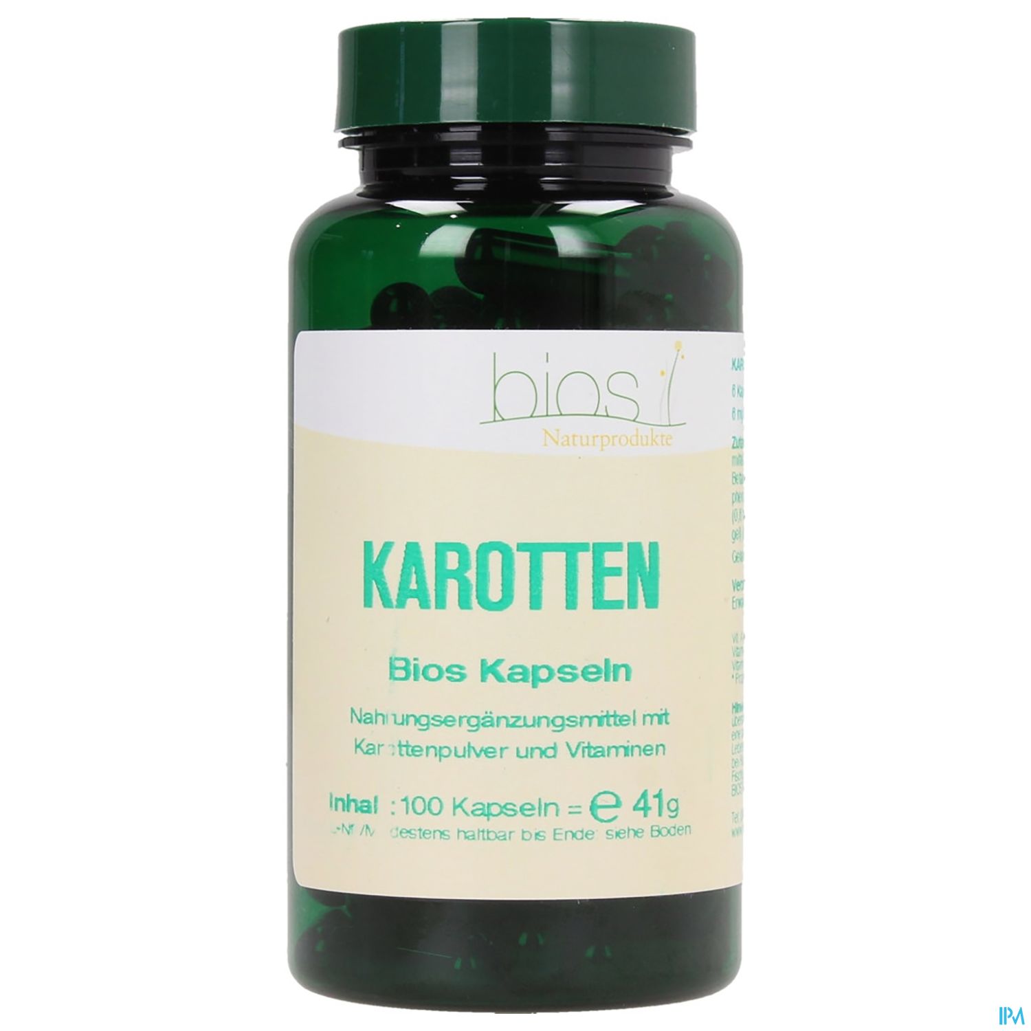 Grüne Flasche mit Kapseln, beschriftet mit "Karotten Bios Kapseln", für Nahrungsergänzungsmittel mit Karottenpulver und Vitaminen.
