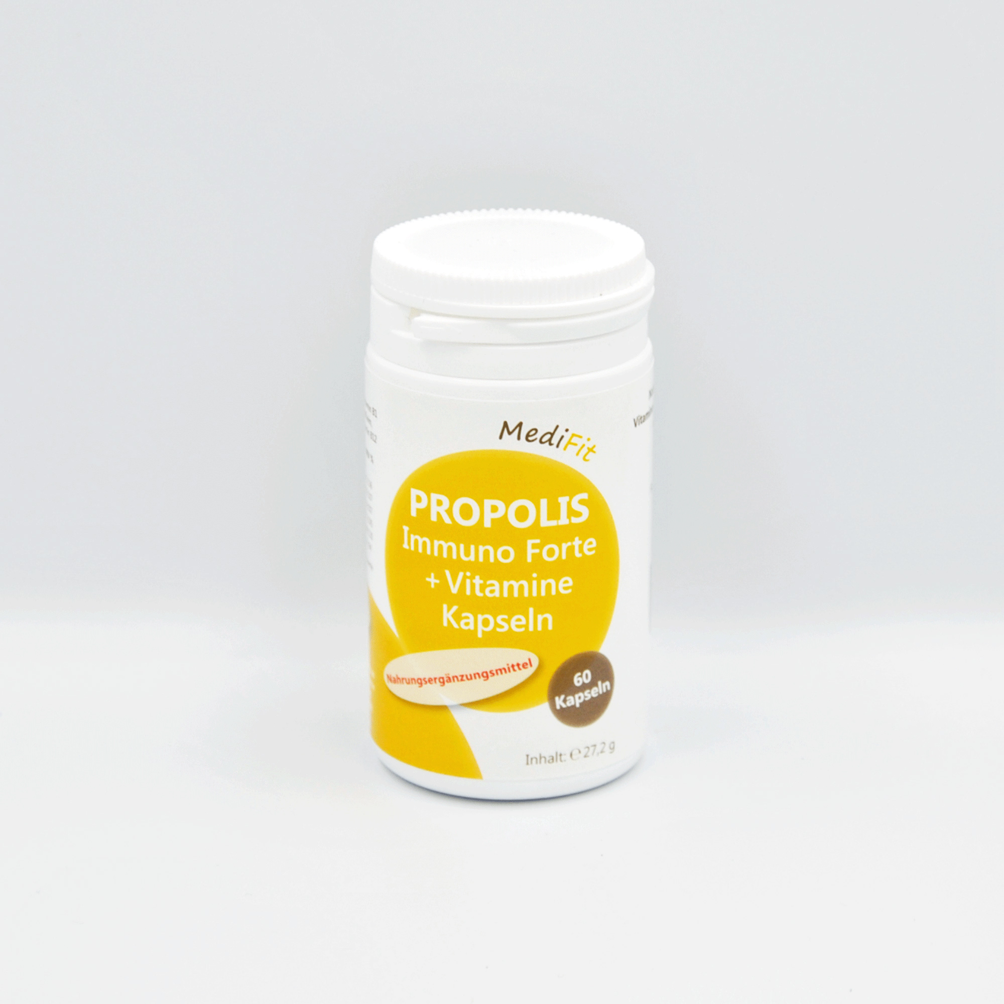 Weißes Fläschchen mit gelbem Etikett, das Propolis Immuno Forte + Vitamine Kapseln enthält.